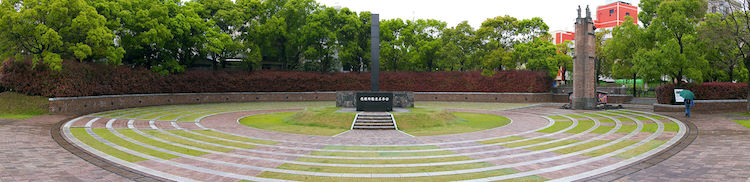 Photo: Panoramic view of the monument marking the hypocenter, or ground zero, of the atomic bomb explosion over Nagasaki. Credit: Wikimedia Commons.