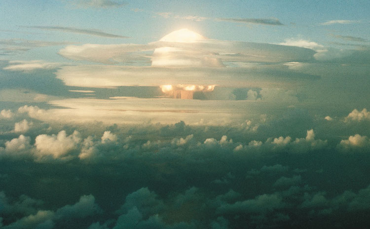 Image: U.S. nuclear weapon test Ivy Mike, 31 Oct 1952, on Enewetak Atoll in the Pacific, the first test of a thermonuclear weapon (hydrogen bomb). Source: Wikipedia.