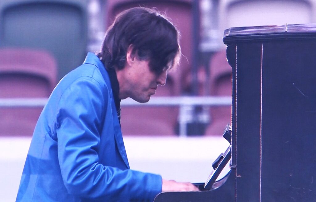 Mr. Jacob Koller played “Merry Christmas, Mr. Laurence” on the A-bombed Piano which miraculously survived the atomic bombing of Hiroshima in 1945. Photo: Yukie Asagiri, INPS Japan