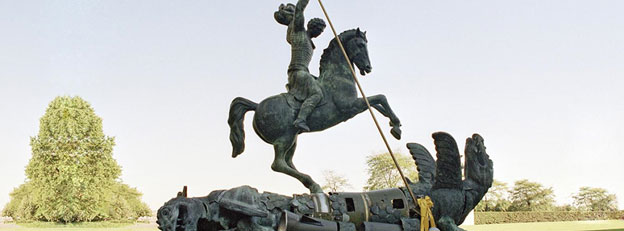 Sculpture depicting St. George slaying the dragon. The dragon is created from fragments of Soviet SS-20 and United States Pershing nuclear missiles. Credit: UN Photo/Milton Grant