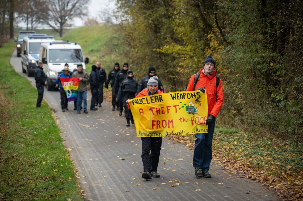 Büchel , Germany:Activists participate in a peace walk against nuclear weapons around Büchel Military Air Base.. Image Credit :shutterstock