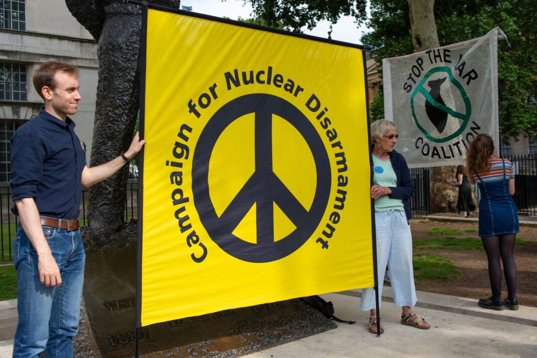 London,,Uk.,26th,June,London, UK. 26th June 2019. Anti-war protesters with banners at the DON'T ATTACK IRAN protest in Whitehall, London, to put pressure on the UK. Image Credit: shutterstock